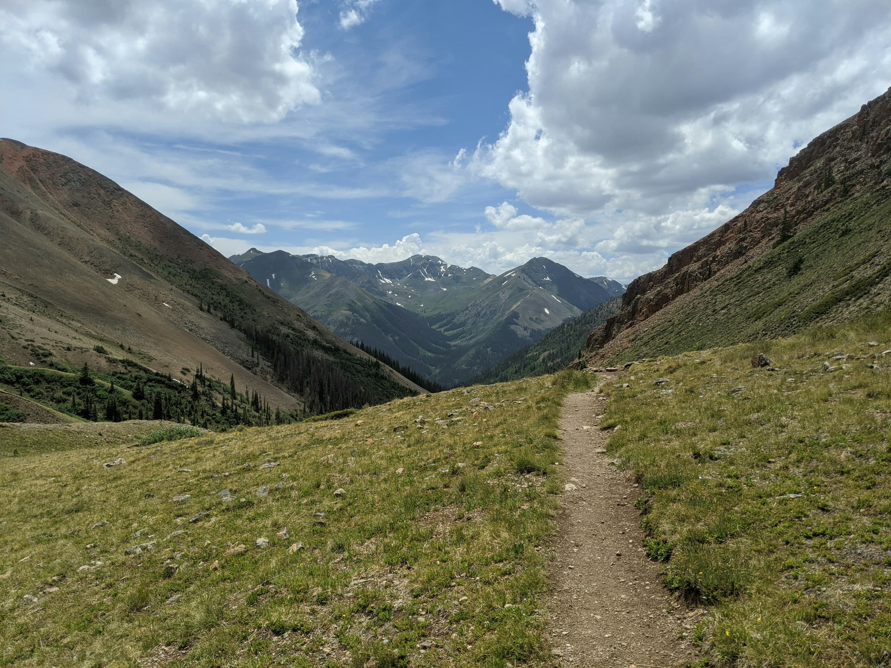 Mountain trail winding through a Colorado valley